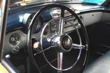 Original stock chrome horn ring and black steering wheel in 1951 Buick Estate Wagon woodie