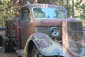 Restorable 1930's Ford truck in vintage car storage yard