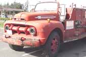 Rare 1950's Ford f7 firetruck in original condition, at classic truck storage yard
