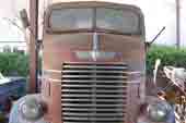 Very cool Dodge COE truck cab stored in vintage car wrecking yard